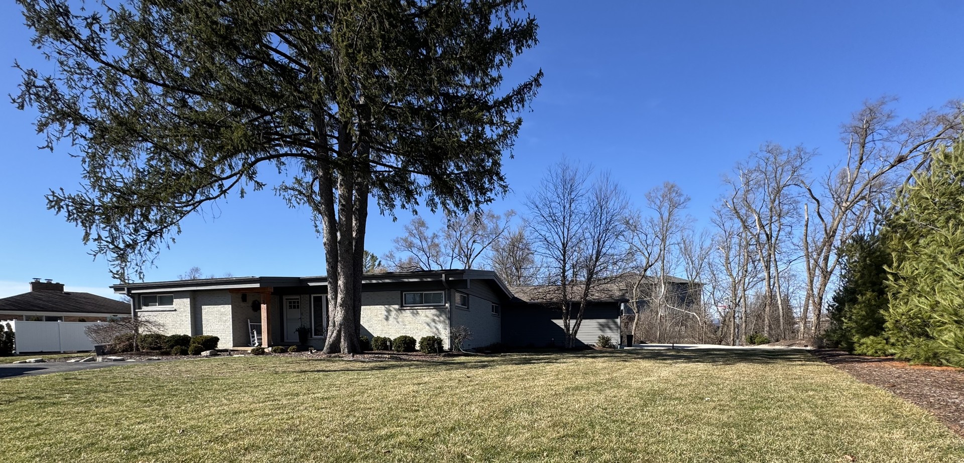 a house with trees in front of it