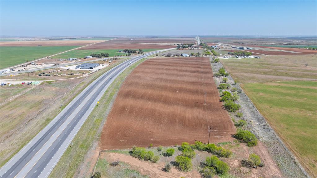 277 North Haskell Tx 79521 Haskell, TX 79521 - Photo 3 of 12 a view of a multi story building with a yard