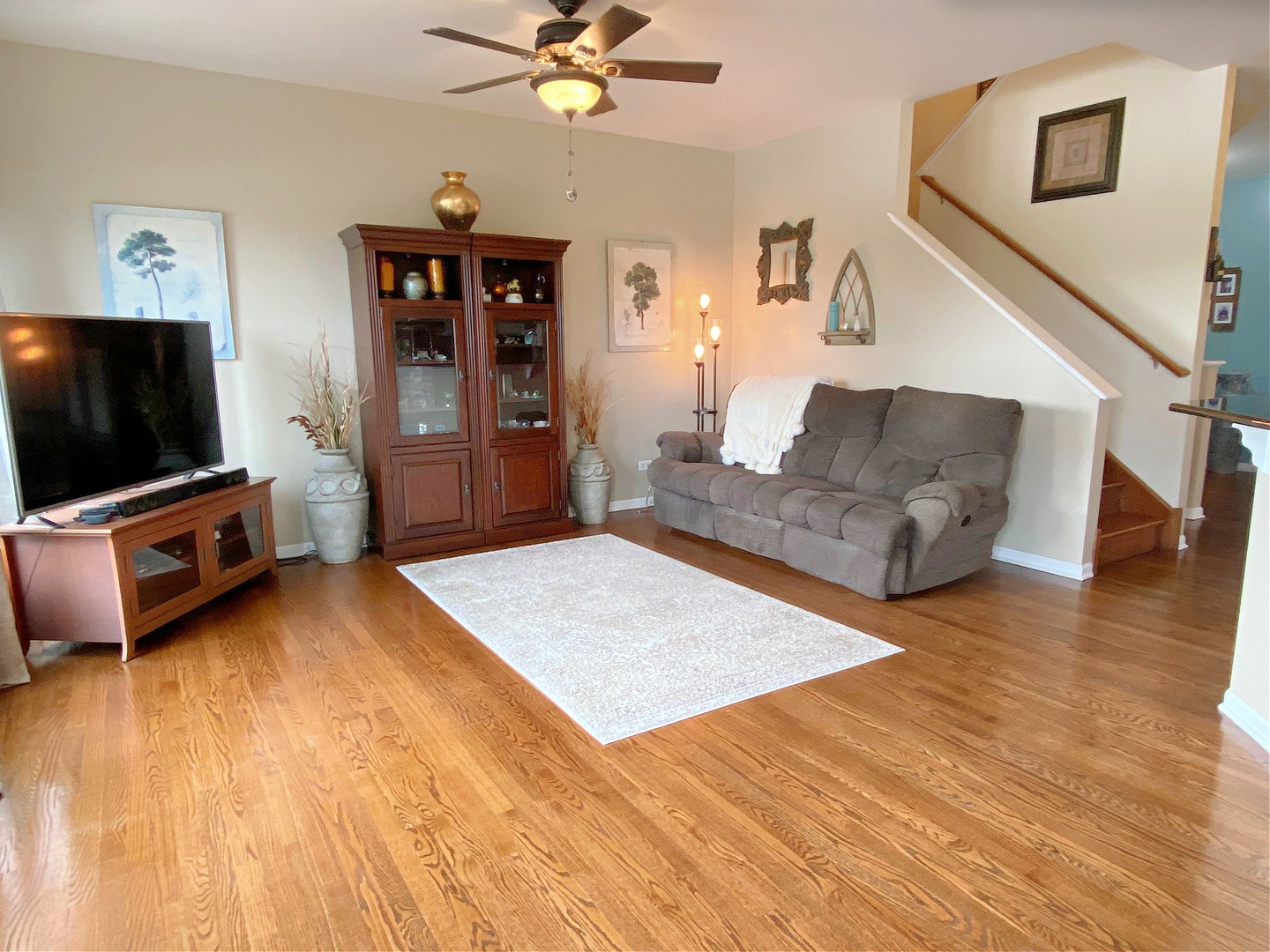 1197 Freedom Road Elburn, IL 60119 - Photo 12 of 31 a living room with furniture and a flat screen tv