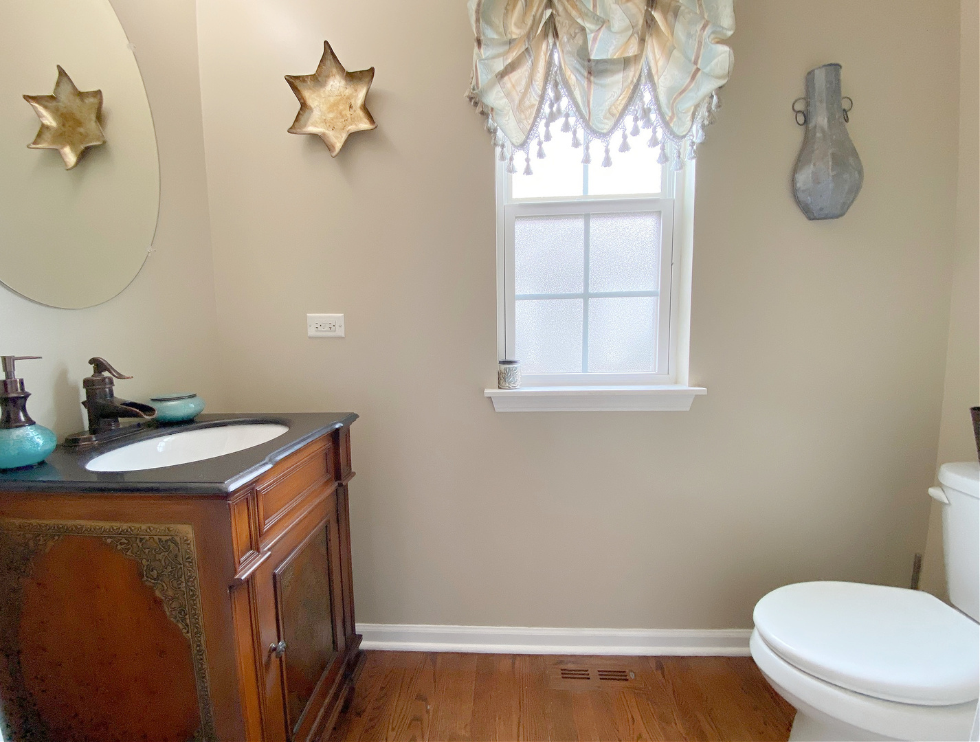 1197 Freedom Road Elburn, IL 60119 - Photo 14 of 31 a bathroom with a sink a toilet and a mirror