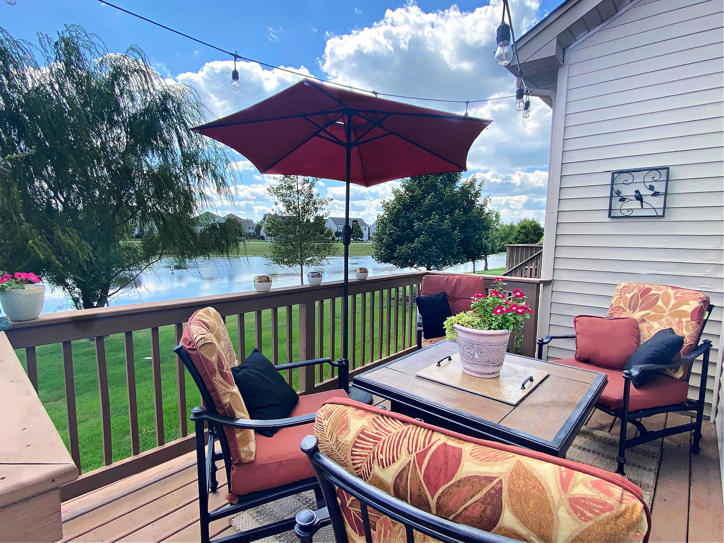1197 Freedom Road Elburn, IL 60119 - Photo 29 of 31 a balcony with wooden floor table and chairs