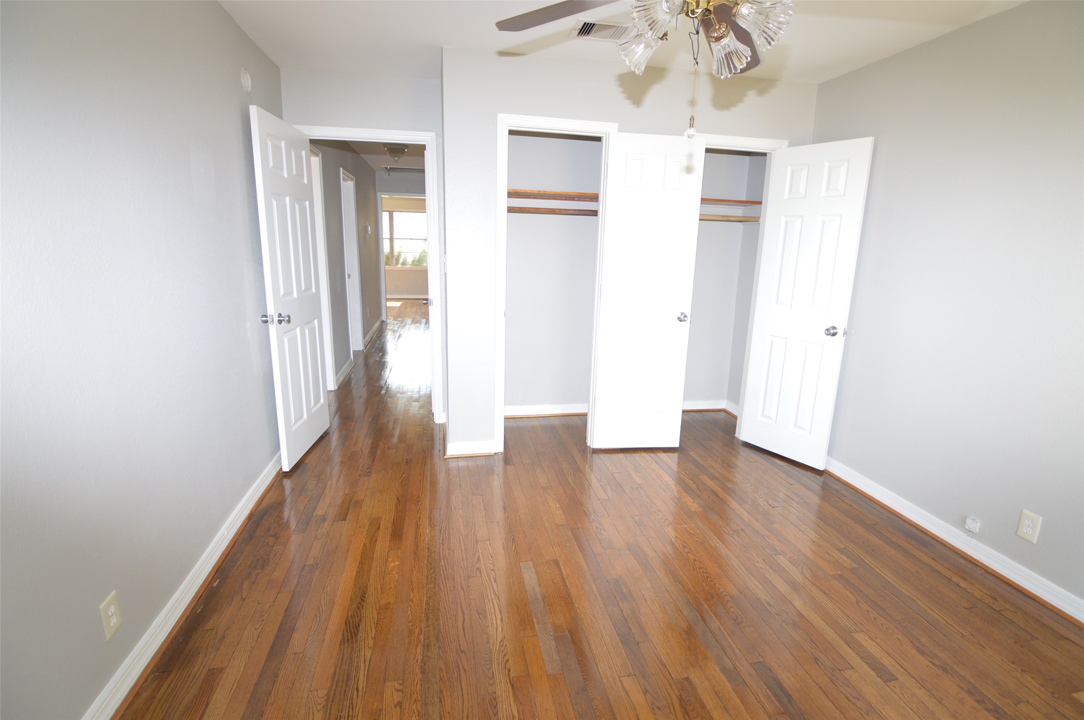 1403 Elton Street Houston, TX 77034 - Photo 17 of 21 wooden floor in an empty room with a window
