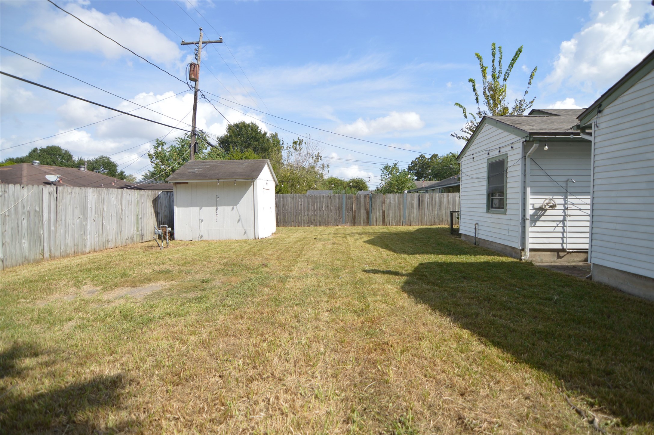 1403 Elton Street Houston, TX 77034 - Photo 18 of 21 a house view with a backyard space