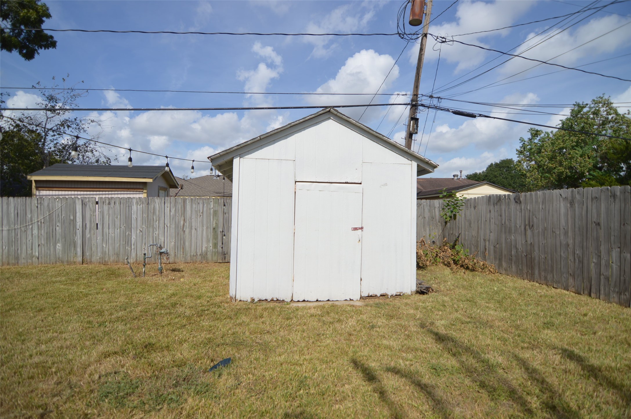 1403 Elton Street Houston, TX 77034 - Photo 20 of 21 a view of a backyard