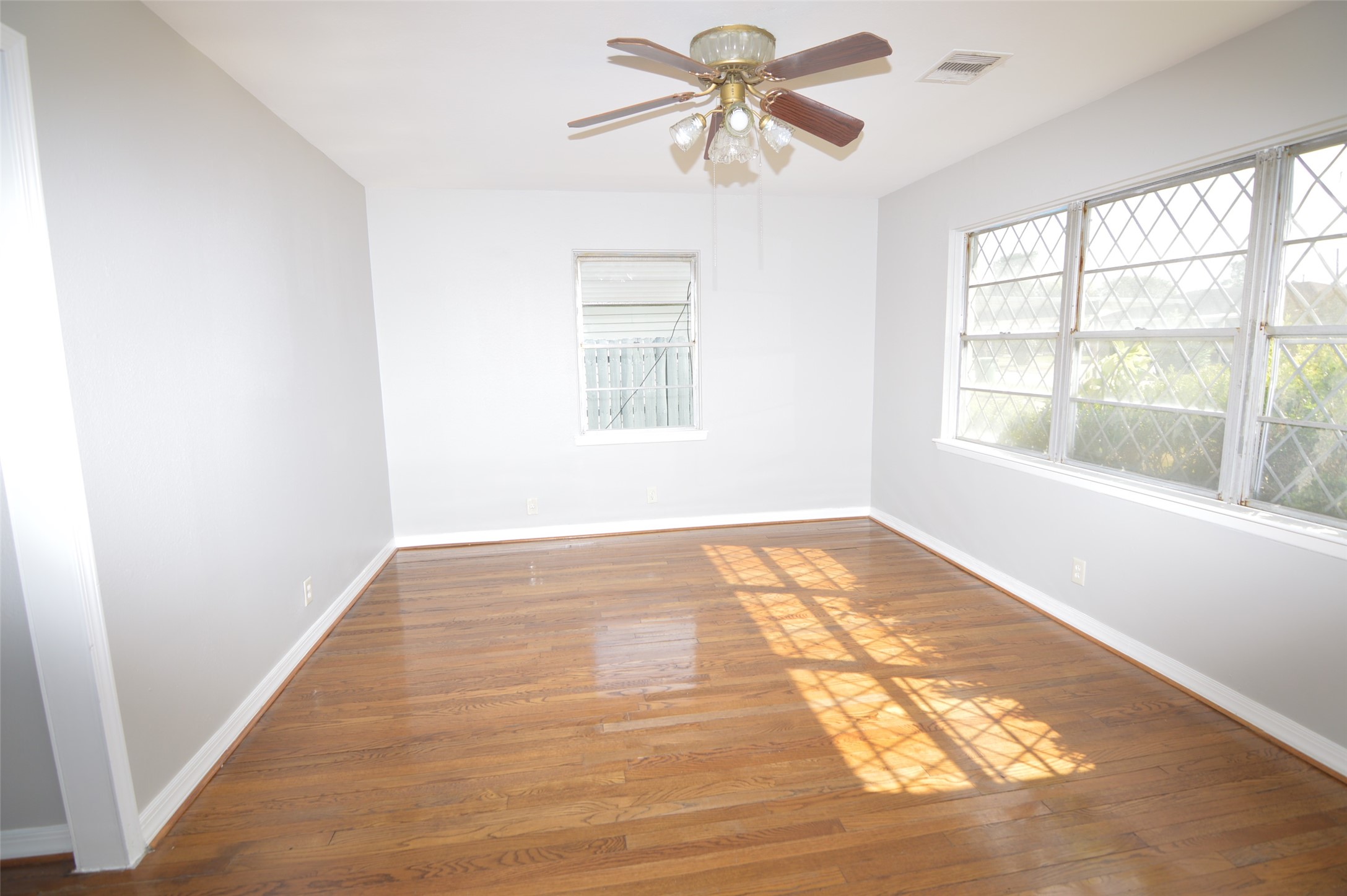 1403 Elton Street Houston, TX 77034 - Photo 2 of 21 a view of an empty room and window