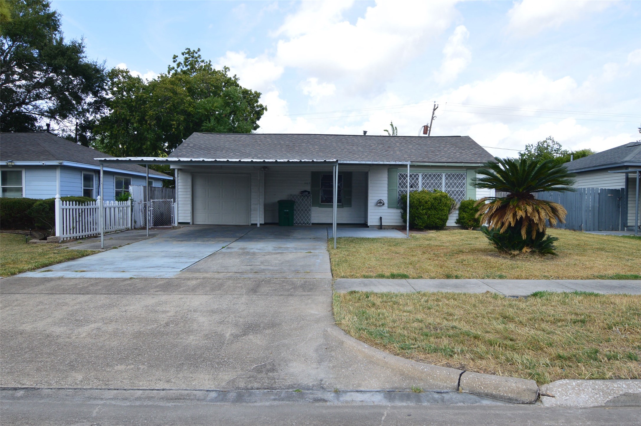 1403 Elton Street Houston, TX 77034 - Photo 21 of 21 front view of a house with a yard