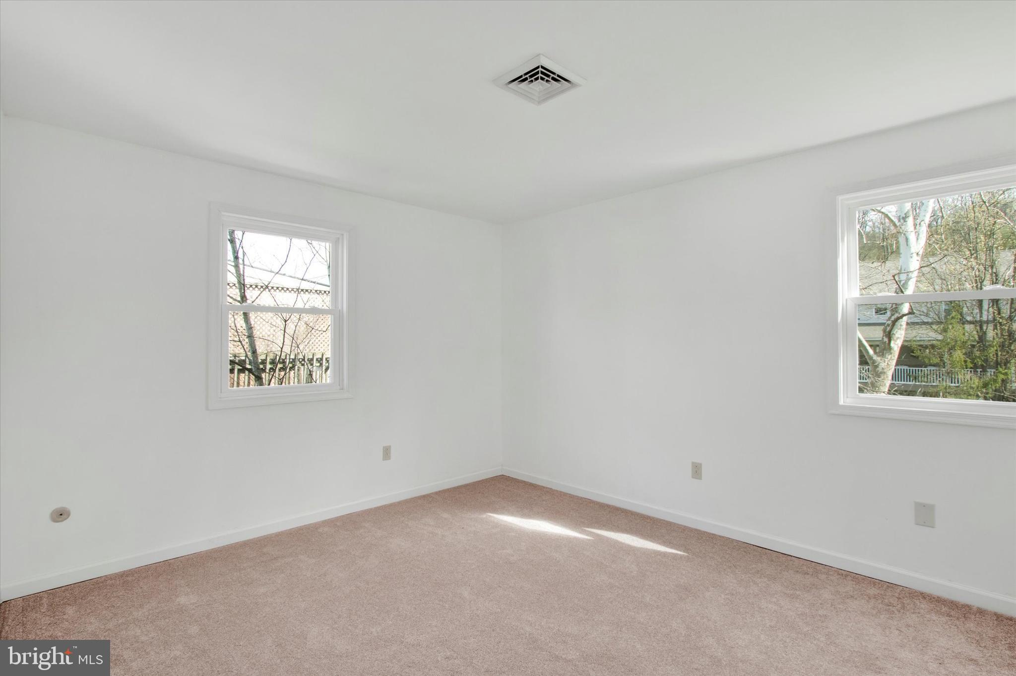 744 Tamarack Trail Reading, PA 19607 - Photo 12 of 27 an empty room with windows