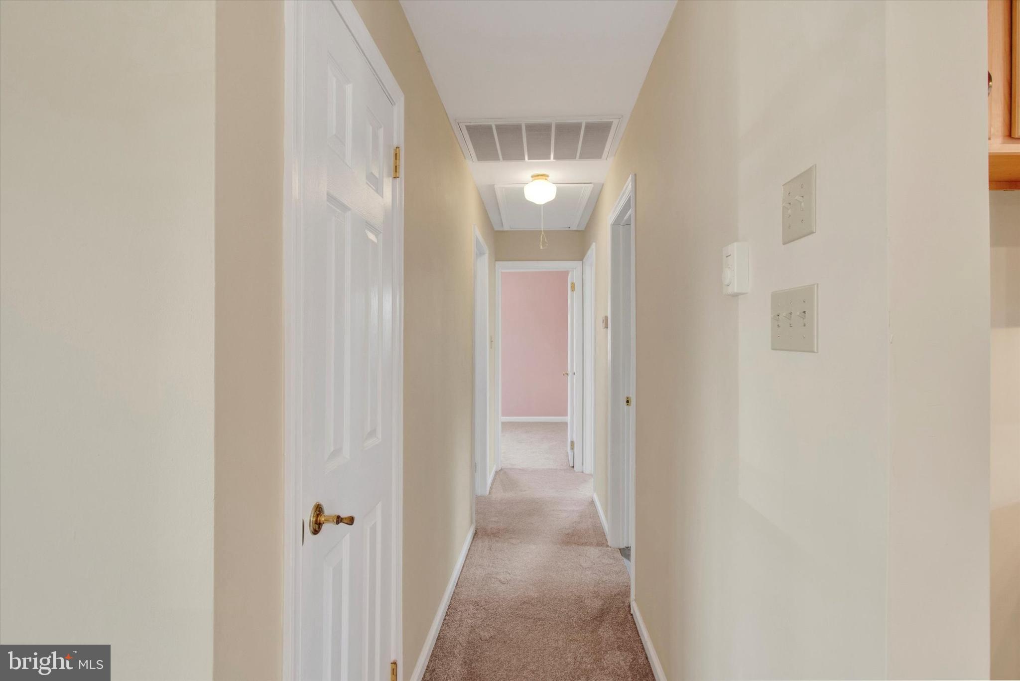 744 Tamarack Trail Reading, PA 19607 - Photo 7 of 27 a view of a hallway with wooden floor