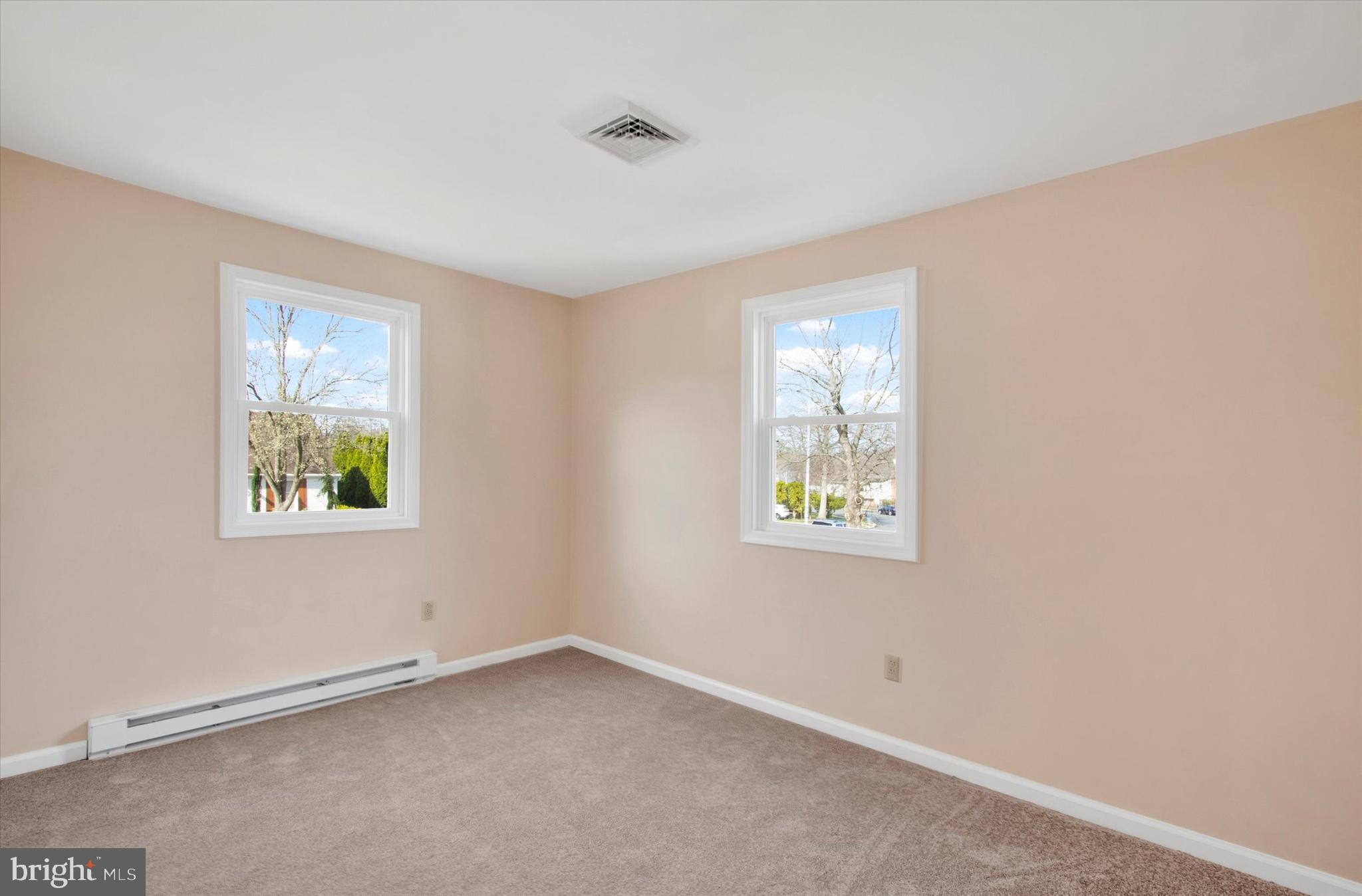 744 Tamarack Trail Reading, PA 19607 - Photo 10 of 27 an empty room with windows
