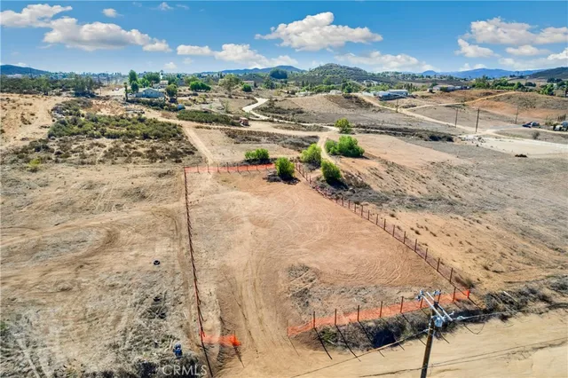a view of a beach with a mountain