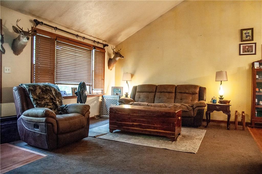 687 Bullcreek Road Butler, PA 16002 - Photo 12 of 19 a living room with a couch and a table