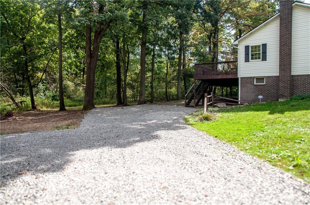 687 Bullcreek Road Butler, PA 16002 - Photo 3 of 19 a view of a house with backyard and a tree