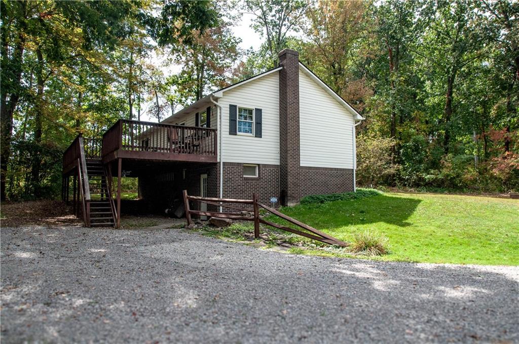 687 Bullcreek Road Butler, PA 16002 - Photo 5 of 19 a view of backyard with outdoor seating and green space