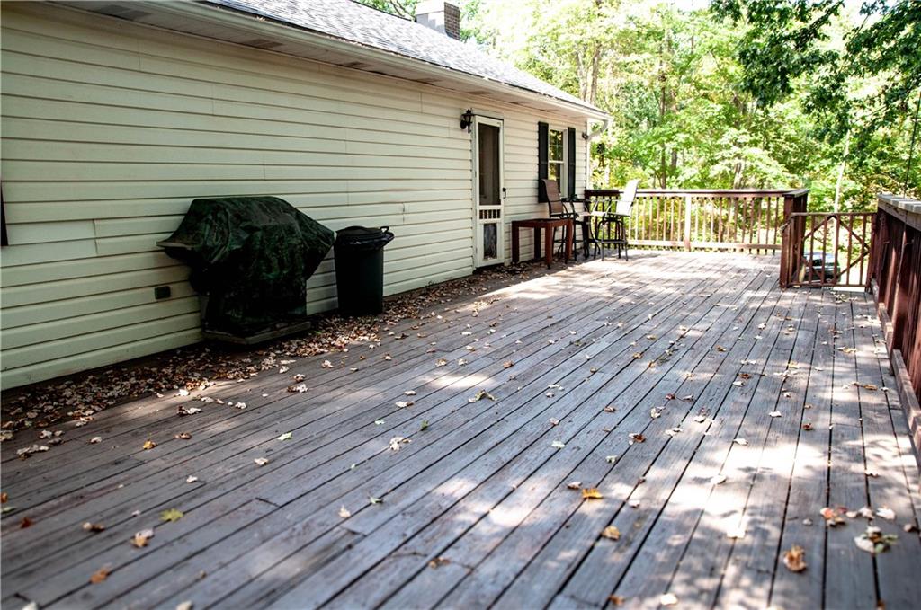 687 Bullcreek Road Butler, PA 16002 - Photo 8 of 19 a view of a chairs on the deck