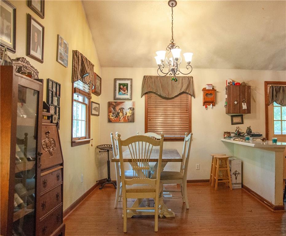 687 Bullcreek Road Butler, PA 16002 - Photo 10 of 19 a view of a dining room with furniture and chandelier