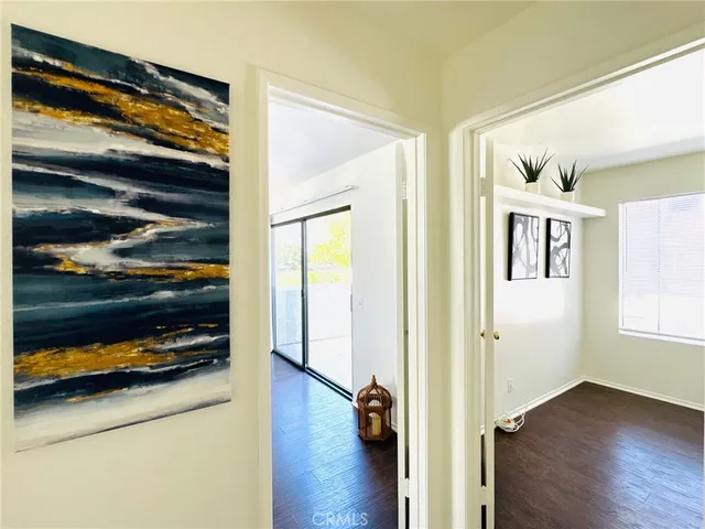 a view of a entryway door of the room