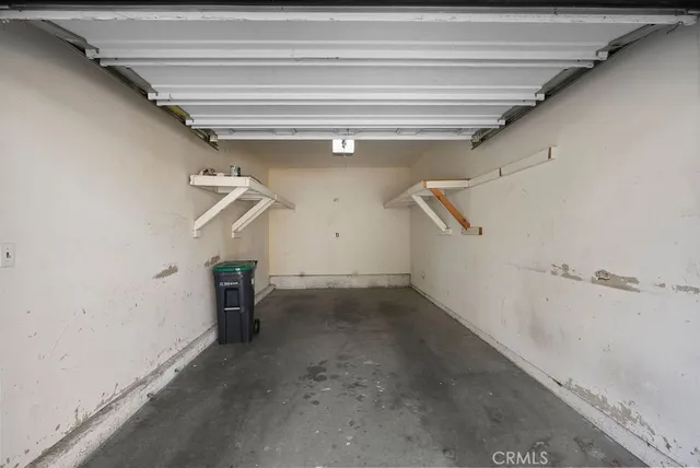 a view of a hallway with stairs