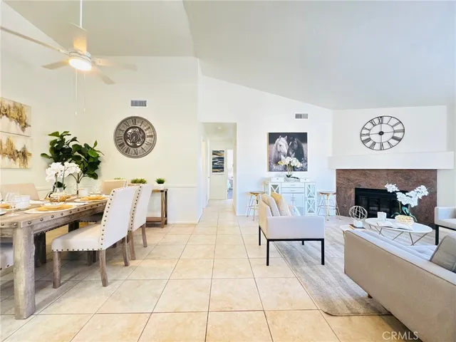 a living room with furniture and a table
