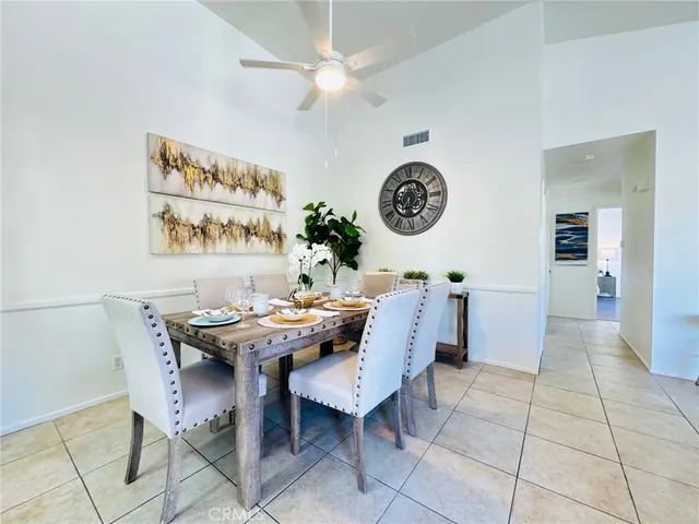a view of a table and chairs in a room
