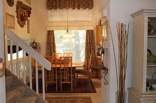 a kitchen with a stove a sink and a refrigerator