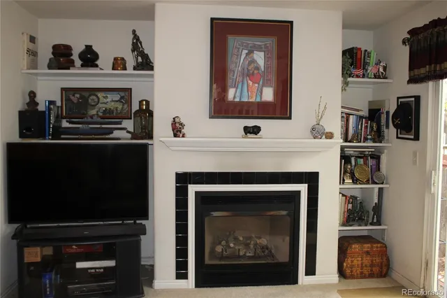 a view of a living room and entry way