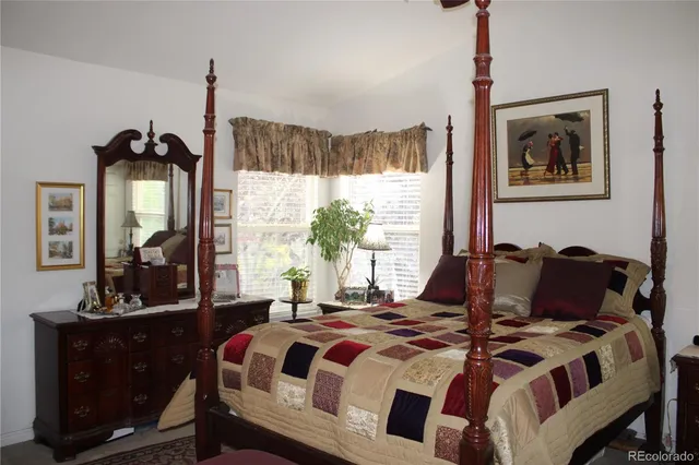 a kitchen with a stove a sink and a refrigerator