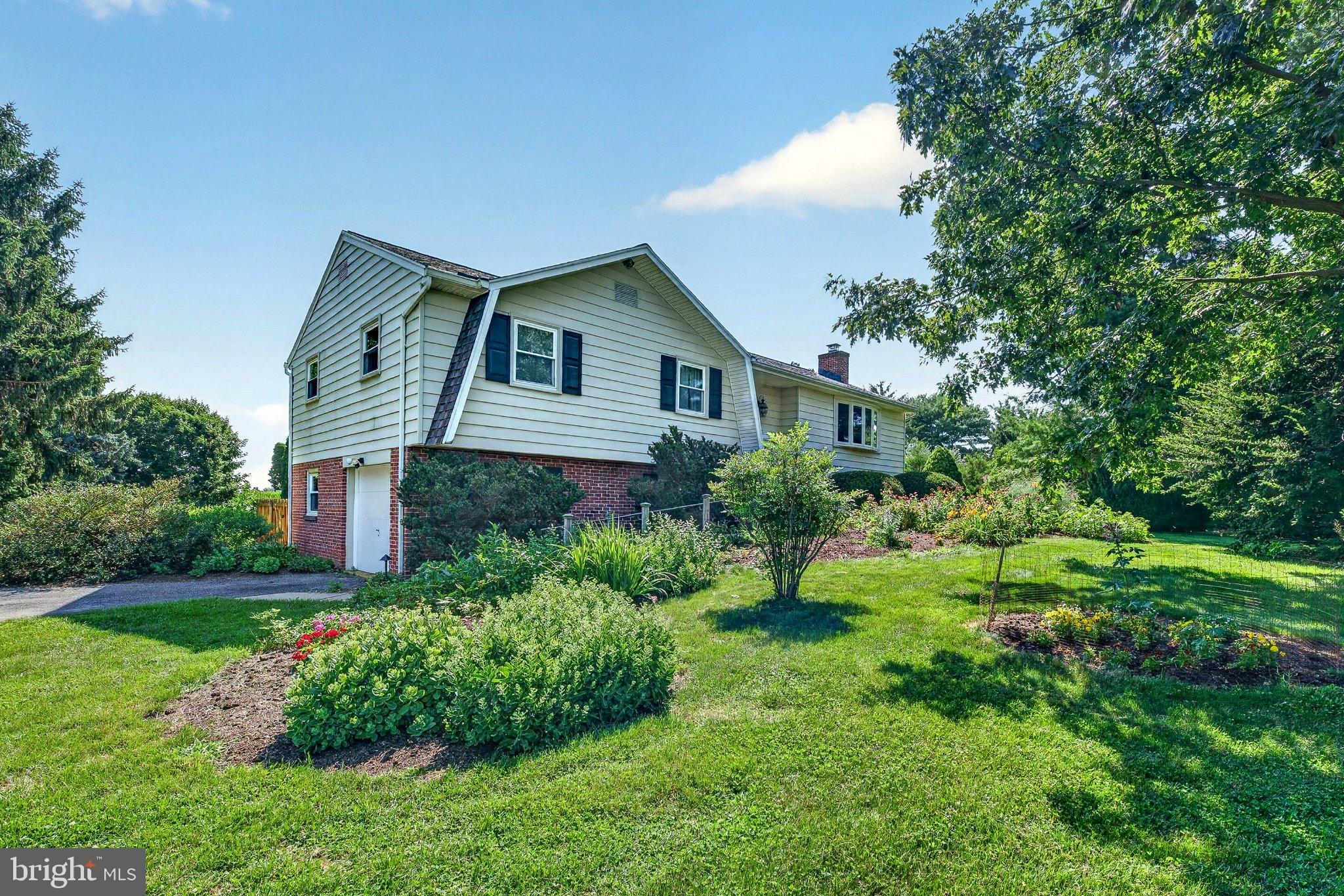 1277 South Colebrook Road Manheim, PA 17545 - Photo 1 of 65 Charming home nestled in lush greenery.