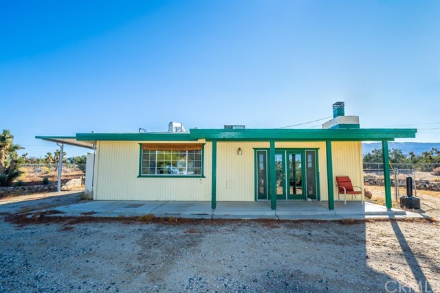 2223 Cholla Road Pinon Hills, CA 92372 - Photo 1 of 1 a view of a house with a yard