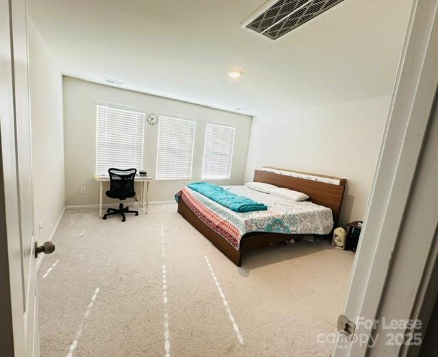 15619 Country House Street Charlotte, NC 28273 - Photo 13 of 19 a bedroom with a bed and furniture