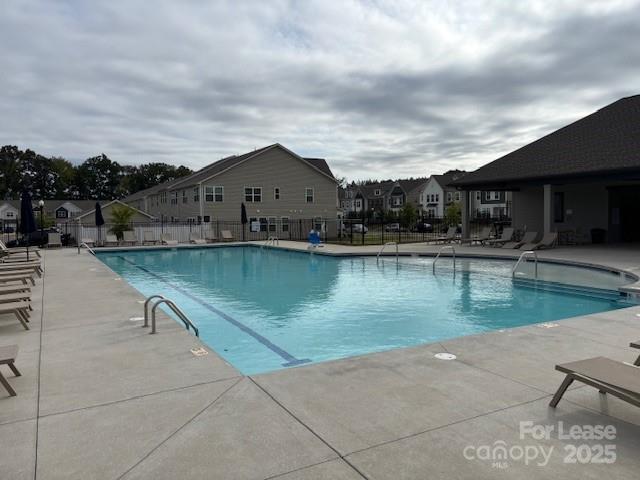 15619 Country House Street Charlotte, NC 28273 - Photo 18 of 19 a view of a swimming pool with a lake