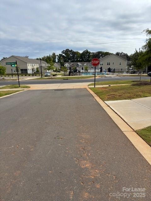 15619 Country House Street Charlotte, NC 28273 - Photo 19 of 19 a view of an swimming pool and an outdoor seating