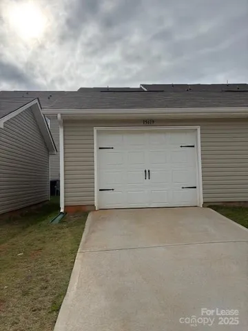 a view of a house with garage