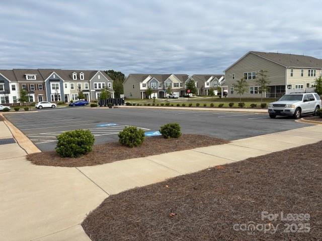 15619 Country House Street Charlotte, NC 28273 - Photo 5 of 19 a view of multiple houses with a yard