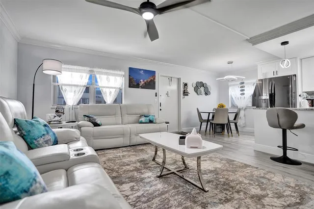 a living room with furniture and a table