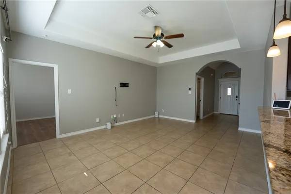 a view of an empty room and window