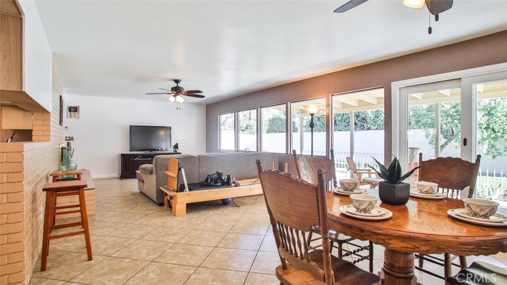 5352 Tower Road Riverside, CA 92506 - Photo 1 of 1 a living room with furniture and a flat screen tv