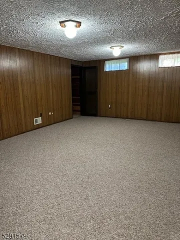 an empty room with a hallway