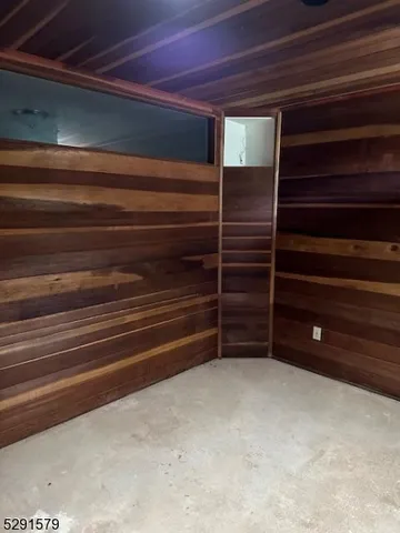 a view of room with a furniture and a window