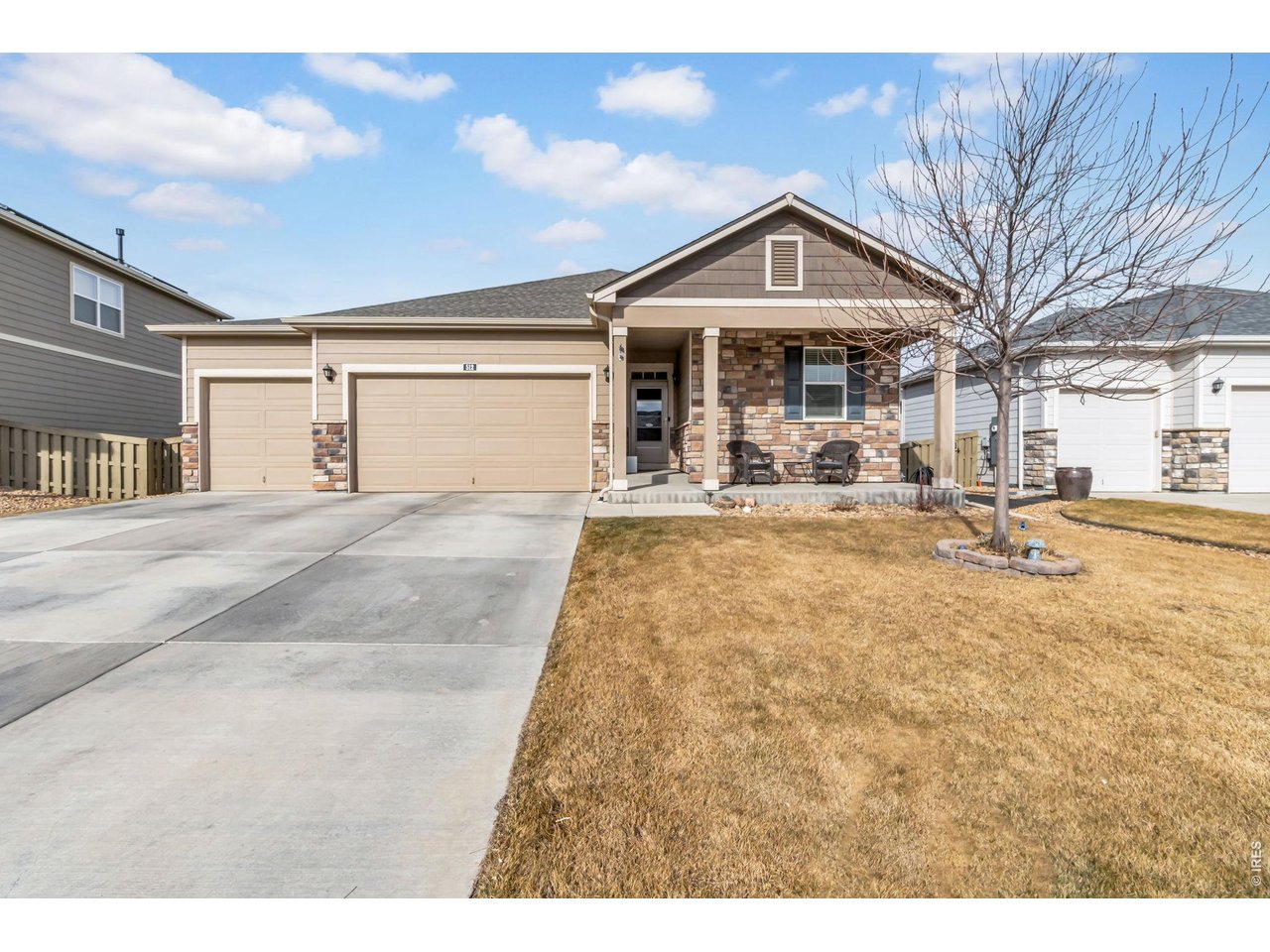512 Buckrake Street Severance, CO 80550 - Photo 2 of 41 a front view of house with yard outdoor seating and barbeque oven
