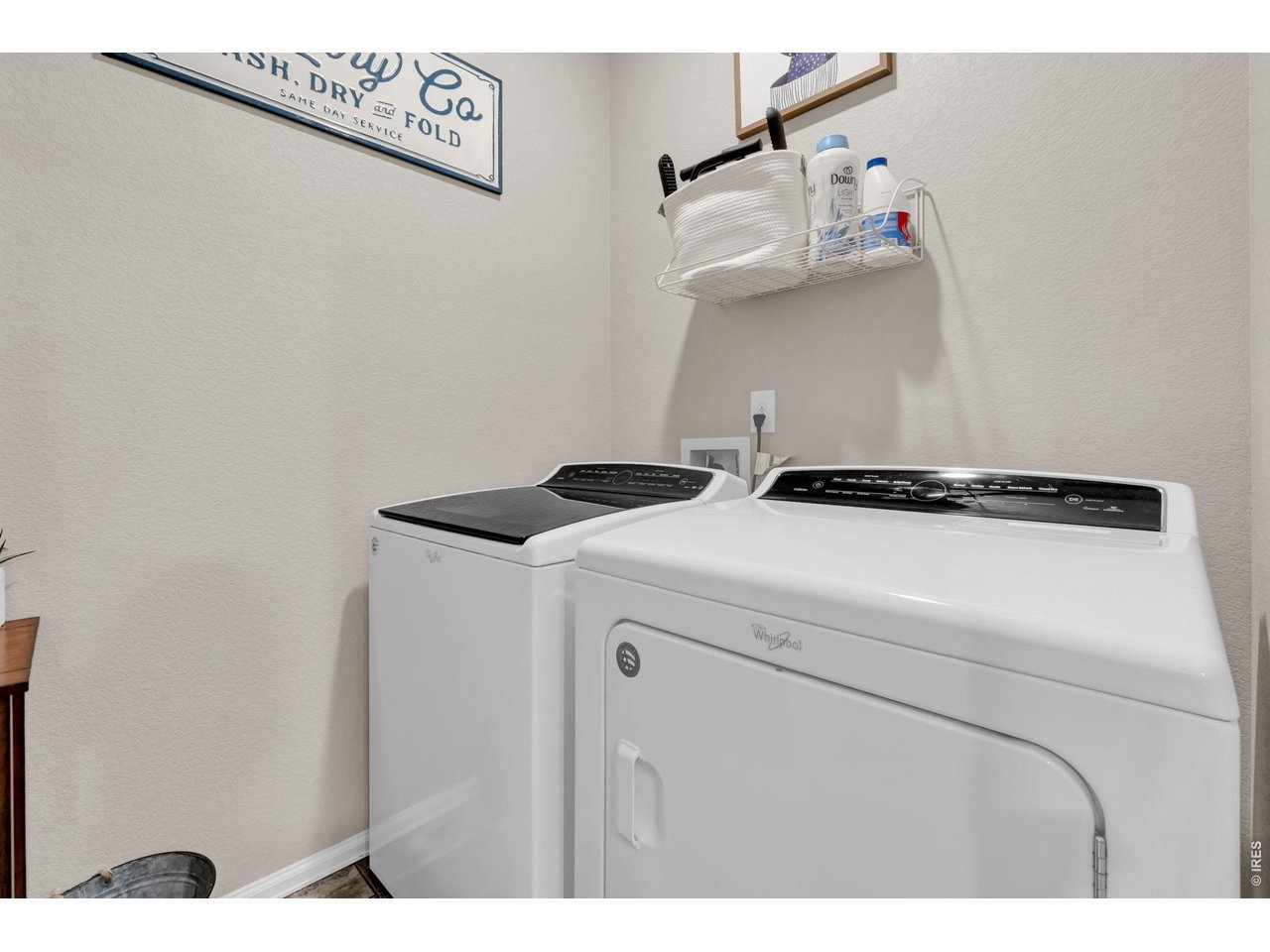 512 Buckrake Street Severance, CO 80550 - Photo 24 of 41 a utility room with dryer and washer