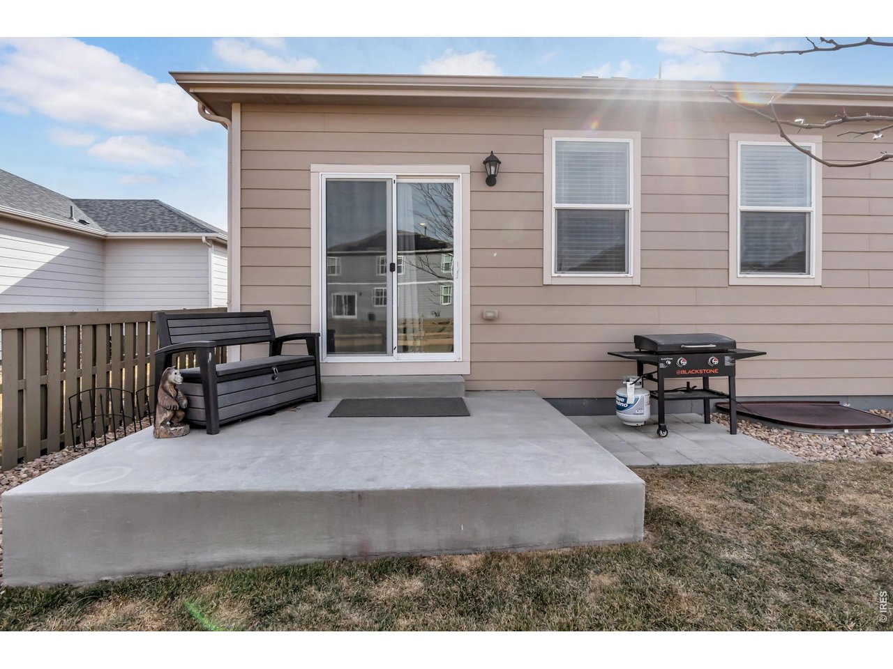 512 Buckrake Street Severance, CO 80550 - Photo 27 of 41 a view of a house with two chairs in a patio