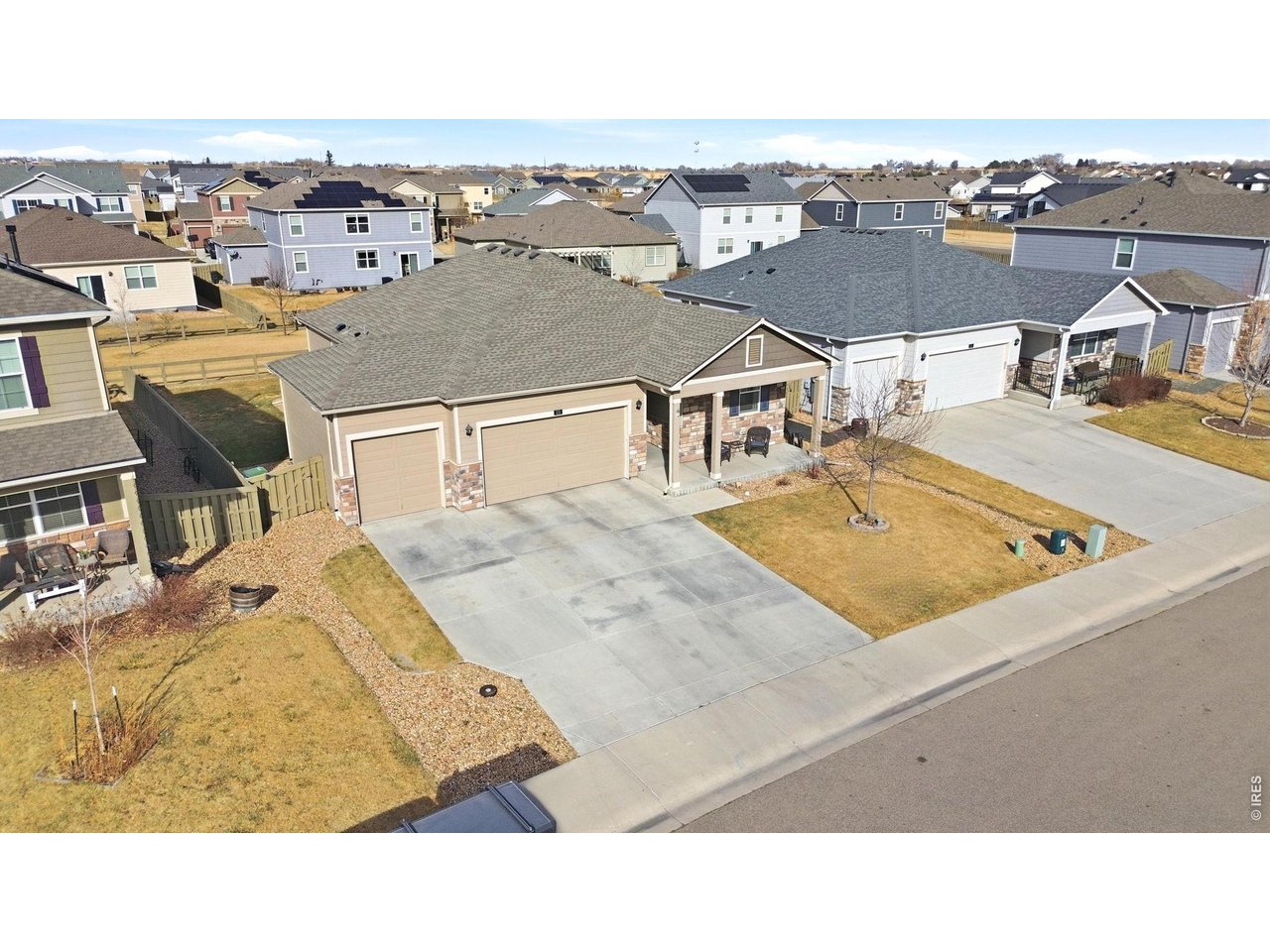 512 Buckrake Street Severance, CO 80550 - Photo 38 of 41 a view of a terrace with wooden floor
