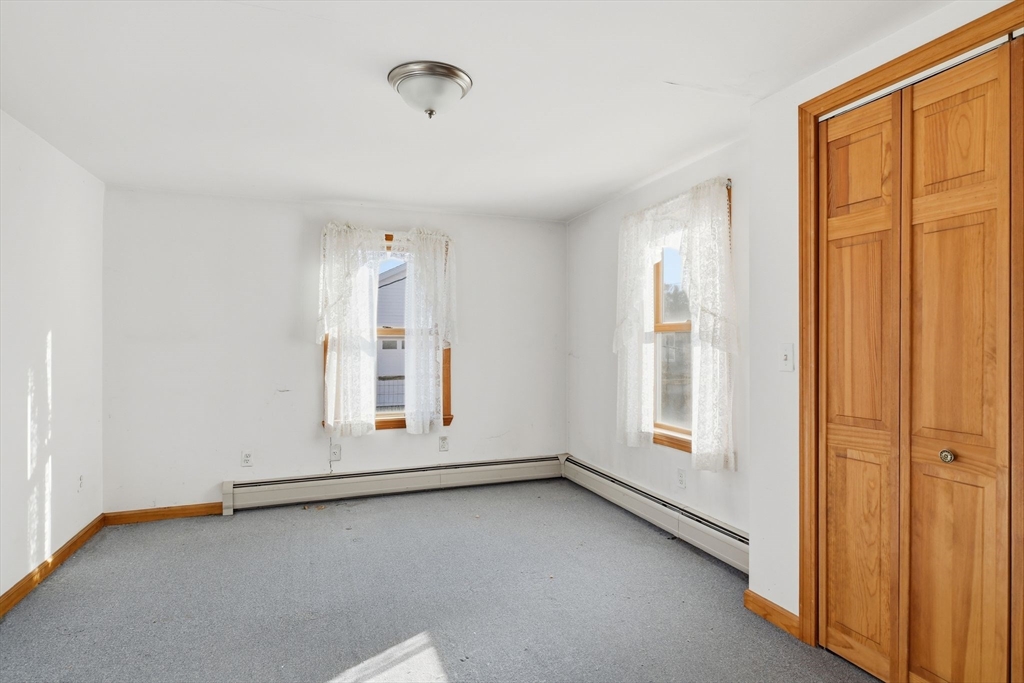 1601 Westover Road Chicopee, MA 01020 - Photo 18 of 32 an empty room with windows