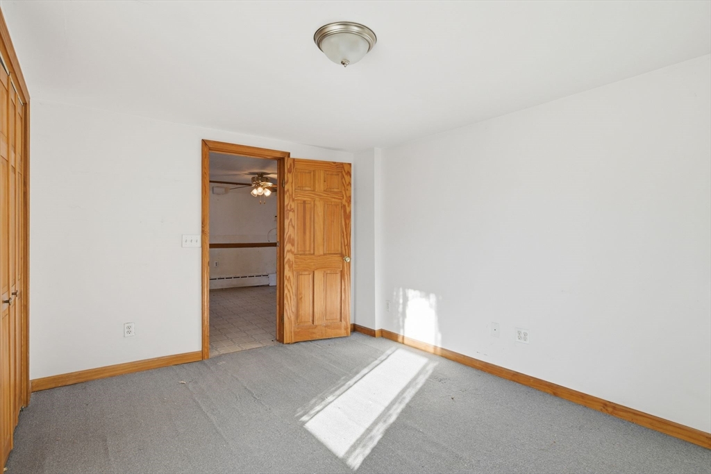 1601 Westover Road Chicopee, MA 01020 - Photo 20 of 32 a view of an empty room with a window