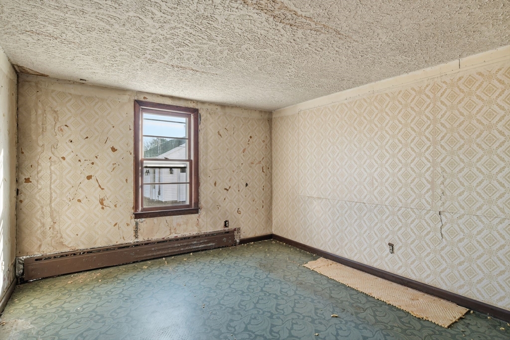 1601 Westover Road Chicopee, MA 01020 - Photo 21 of 32 an empty room with windows