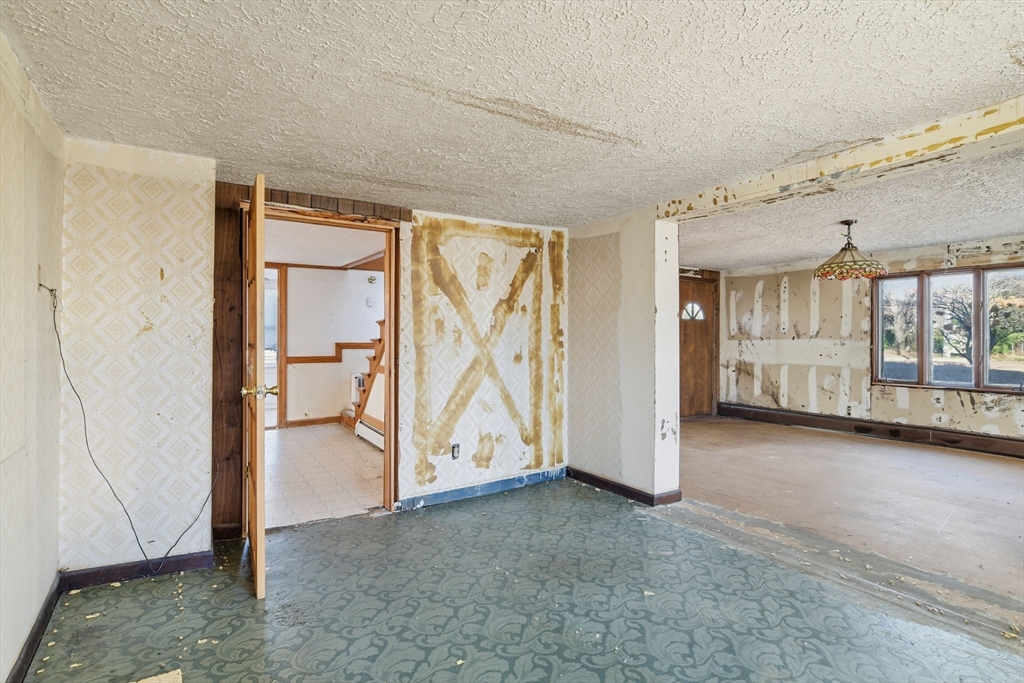 1601 Westover Road Chicopee, MA 01020 - Photo 22 of 32 a view of an empty room and window