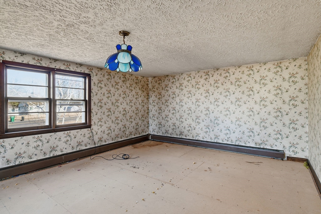 1601 Westover Road Chicopee, MA 01020 - Photo 26 of 32 a view of a hallway with a window