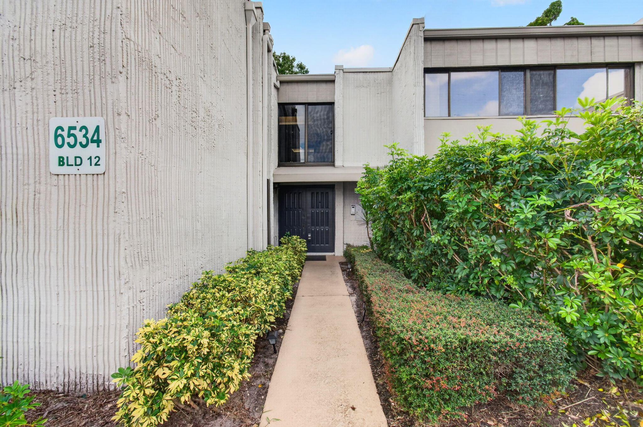 6534 Spring Bottom Way, Unit 124 Boca Raton, FL 33433 - Photo 1 of 31 02_Entry-Walkway