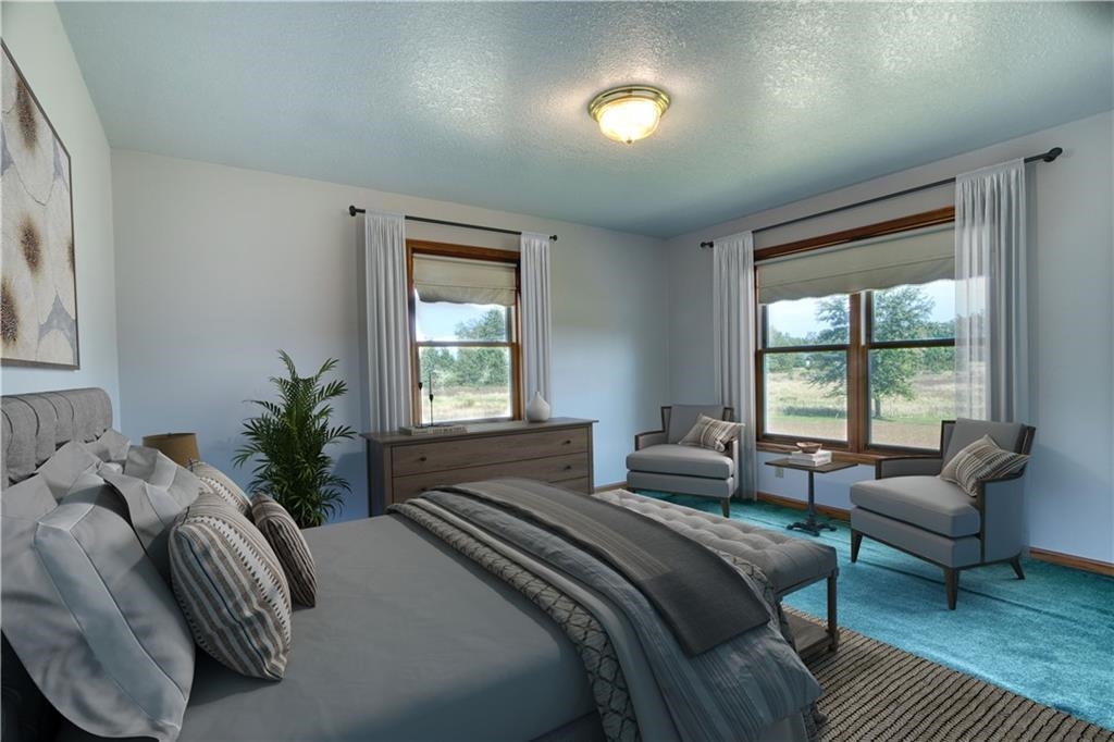 9018 North Anderson Road Hayward, WI 54843 - Photo 19 of 42 Bedroom with a textured ceiling and carpet flooring