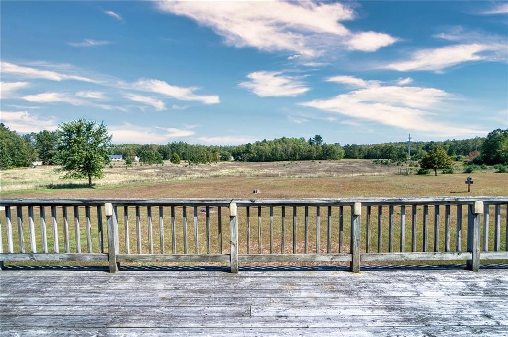 9018 North Anderson Road Hayward, WI 54843 - Photo 27 of 42 Wooden deck with a view of rural / pastoral area